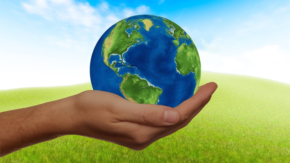 earth in a person's hand